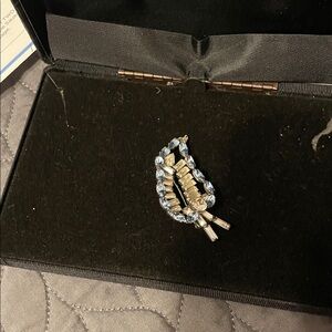 Elegant Silver and Blue Brooch